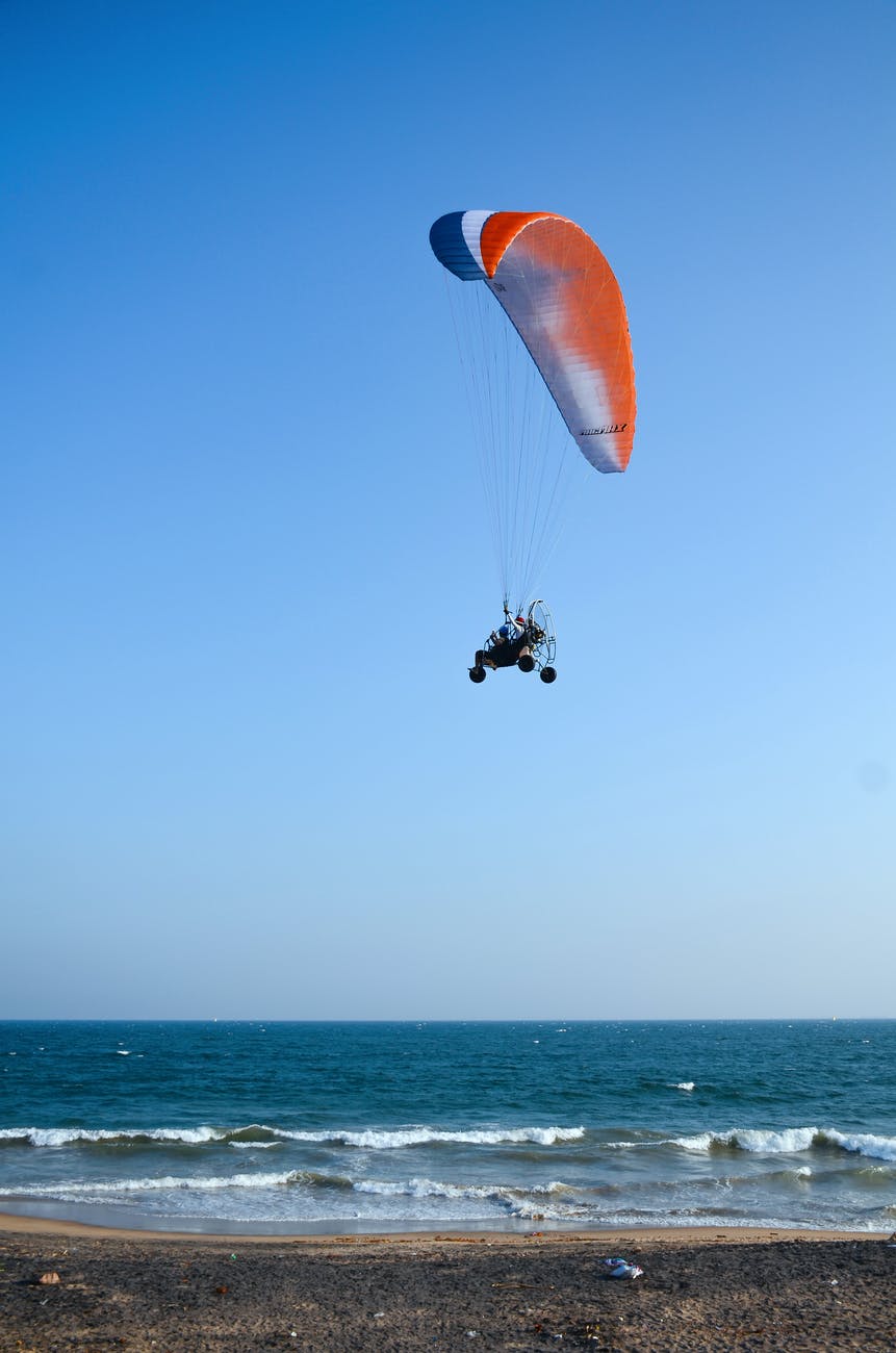 person riding a parachute